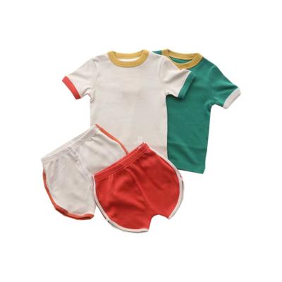 China Wholesale vintage kids boutique summer tracksuit kids fancy 2 piece set toddler short sleeve ribbed splice home wear outfit for sale