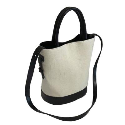 China Soft Fashion Messenger Tote Bucket Bag Canvas Portable Bag for sale