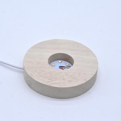 China New Design Modern USB Charging Light 3d Wooden Round Led Display Light Base With Touch Switch for sale