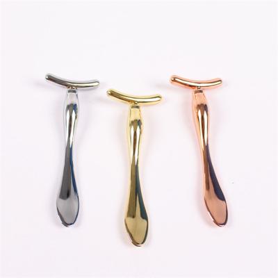 China Luxury Unique Colored Face Roller Stick High Quality Metal Texture Metal Lift Facial Lift Massager Tool for sale