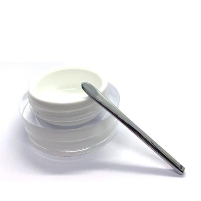 China Hot Selling Silver Cosmetic Spatula Luxury Metal Texture Face Cream Lip Cream Metal Cosmetic Spoon Mini Size Silver Cosmetic Spatula for sale