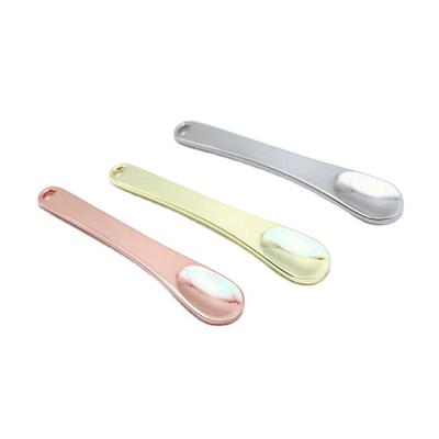 China Newest Fashion Pretty Luxury Texture Metal Spatula Spoon Stick Face Lift Massager Pearl Economic Cosmetic Spoon For Face Cream for sale