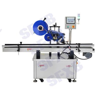 China Food Product SFXB SF-3010 Custom Automatic Plastic Card Scratch Flat Sachet Labeling Machine for sale