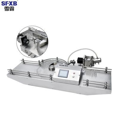 China Manual Beverage SFXB Penicillin Desktop Bottle Cap Packing And Filling Machine For Cosmetic Packing Machine for sale