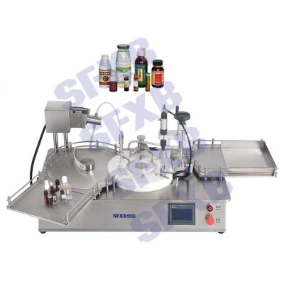 China SFXB XBXG-20 Electric Desktop Rotary Type Food Filling And Capping Machine for sale