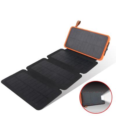 China Outdoor Waterproof Portable Flashlight New Energy Solar Panel 10000mah Charger Power Bank for sale