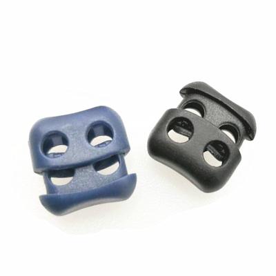 China Garment Accessory 2 Hole Plastic Spring Rope Buckle Rope Nylon Round Lock Toggle Stoppers for sale