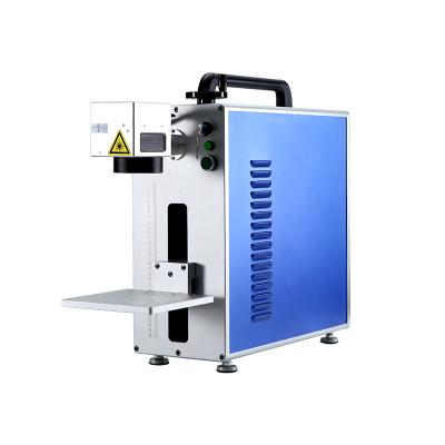 China Sundor 20w 30w 50w Air Cooled Fiber Laser Marking Machine Portable Laser Engrave Machine Desktop Laser Marking Fiber Optic Machine for sale