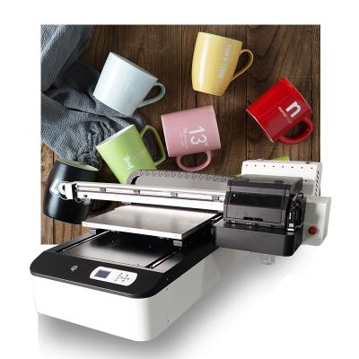 China Garment Shops Hot Sale Phone Case Printer 6090 UV Flatbed Printer PVC UV Bottle Printer for sale