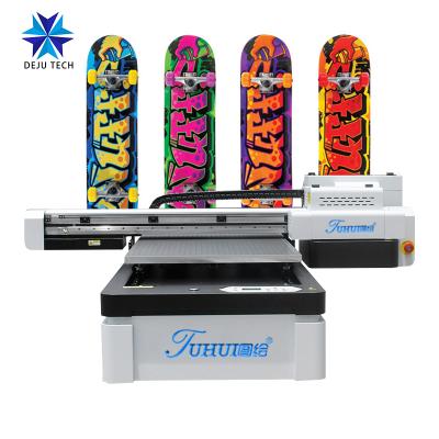 China Decoration Small Size UV ​​Flatbed Printer 6090 Flatbed UV Printer For All for sale