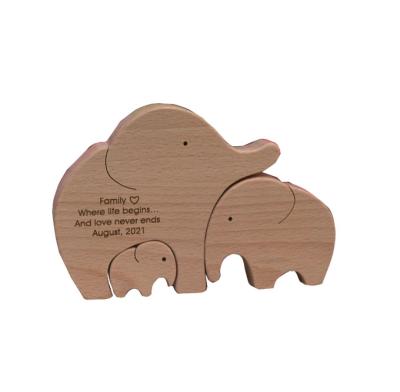 China 100% Handmade Wooden Nursery Decoration Wooden Puzzle Elephant Animal Families Expecting Parents Gift for sale