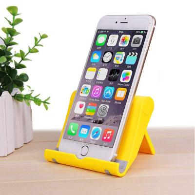 China Universal Mobile Phone Stand Foldable Cell Phone Tablet Desk Lazy Stand For iPhone Ipad Cell for sale