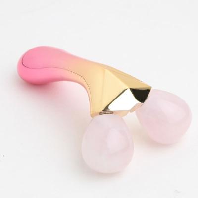 China Hot Sale OEM Jade Stone Facial Anti Aging High Quality Skin Rejuvenation Welded Rose Quartz Pink Jade Roller Natural For Face for sale