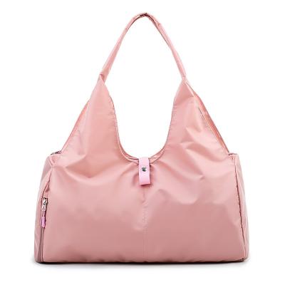 China Universal Waterproof Women Pink Travel Bag Sports Gym Bag With Shoe Compartment for sale