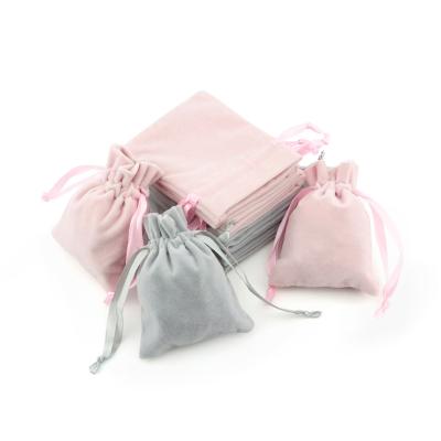 China Universal Factory Wholesale Luxury Small Velvet Jewelry Drawstring Pouch Bag Gift Bag With Ribbon Handle for sale