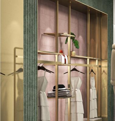 China 020 modern new double high floor rail clothing rack golden promotion shelf for store for sale