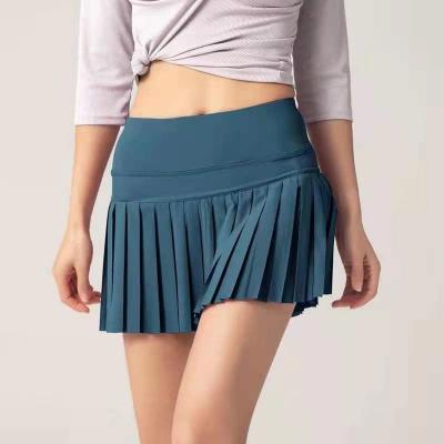 China Breathable UP 2021 Summer Sports Fitness Shorts Female Anti Glare Outdoor Quick Dry Skorts Run Breathable Gym Pleated Skirt for sale