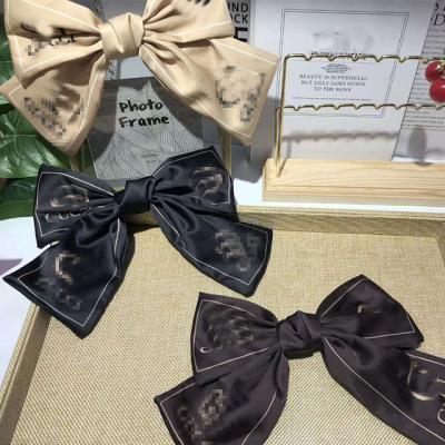 China Korean Style/Korean Style Designer Famous Brand Headband Bow Hair Accessories Hair Card Spot Wholesale for sale