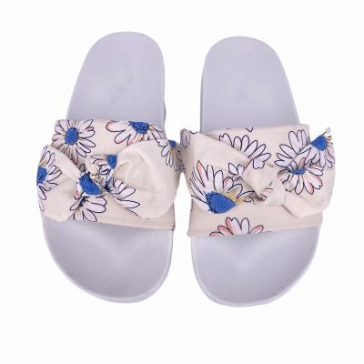 China Fashion trend black bow-knot design printing lovely girls and ladies slippers for sale