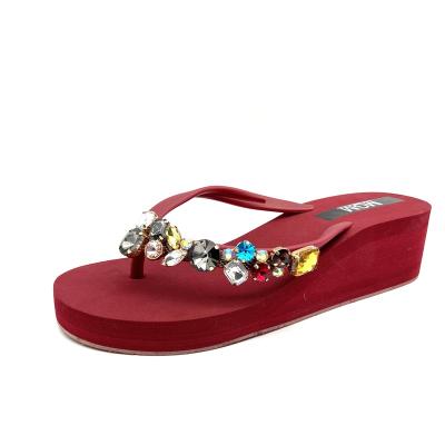 China Cushioning Chic Crystal Embellished Wedge Flip Flops Sandals For Women Summer Beach Party for sale