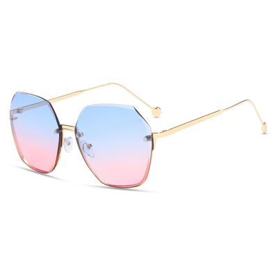 China Fashion Sunglasses 2021 New Rimless Balanced Female Sunglasses Lady Fashion Women Sun Glasses for sale