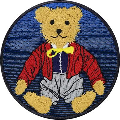 China Custom Cute Yellow Bear Embroidered Patch Badges Wholesale Clothing Accessories Embroidery Seam Decorative Ironed Patch Viable for sale