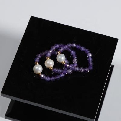 China FASHIONABLE natural baroque pearl ring freshwater amethyst zhiteng female same size elastic line wholesale does not fade for sale