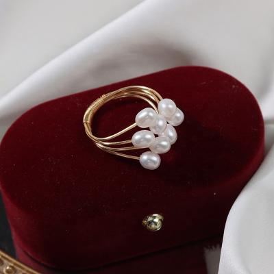 China FASHIONABLE Retro Natural Baroque Freshwater Pearl Ring Winding Rice Shaped Pearl Opening Color Retention Adjustable Wholesale for sale