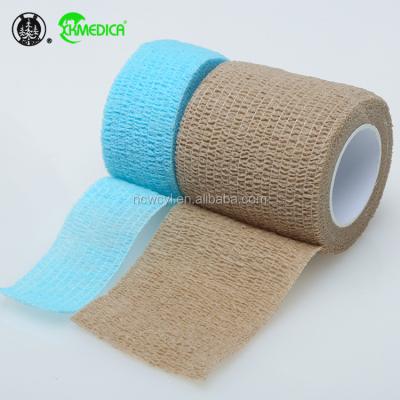 China 100% good quality crepe cotton non woven cohesive cohesive self elastic copoly veterinary colored fabric blister colored veterinary printed adhesive bandage for sale