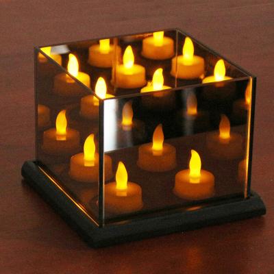 China Infinity Cube Home Decoration 16x12CM Glass Tealight Candle Holder With 4 Candle Reflective Tealight Candle Holder for sale