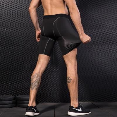 China PRO Shorts Sports Breathable Tight Fitness Running Hot Selling Elastic Quick Dry Men's Tops Sports Pants for sale