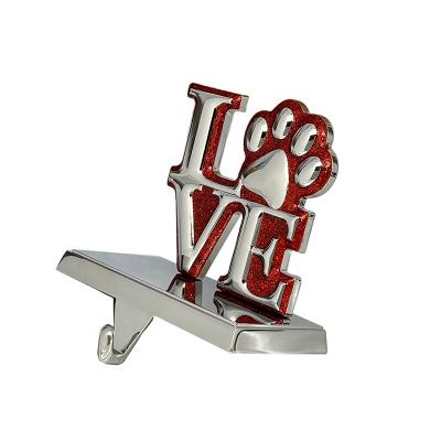 China Silver Love Paw Print Metal Stocking Holder Christmas Day Decoratiom Factory Direct Wholesale Home Decor Mantel With Red Glitter for sale