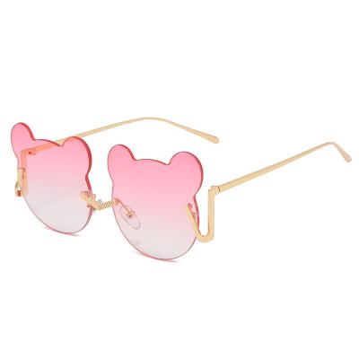 China Fashion Sunglasses New Arrivals Shape Lovely Candy Color Rimless Kids Sunglasses for sale