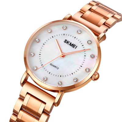 China 1840 Day/Date Trend Design Skmei Rhinestone Mosaic Lady Copper Bracelet 3 Atmosphere Diamond Waterproof Ladies Watches for sale