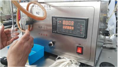 중국 High precise GLF-1-1 Electric Liquid Filling Machine,oil , juice, water, perfume filling machine,bottle filler 판매용