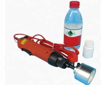 中国 Easy To Operate Electric Hand Held Water Bottle Round Cap Capping Machine/High torque capping machine 販売のため