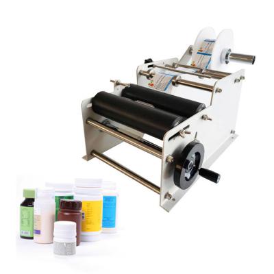 China Hot sale manual labeling machine round bottle labeling machine for sale