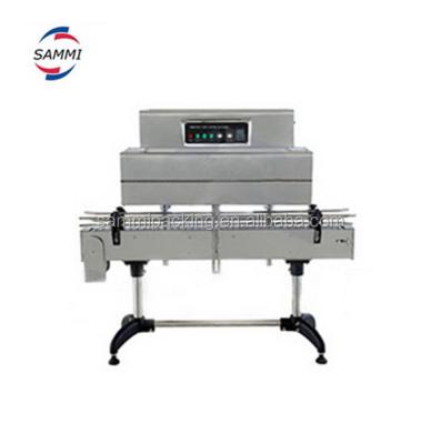 China Semi automatic bottle cap plastic film shrink wrapping machine for sale