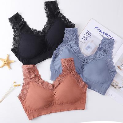 China QUICK DRY women lace up bra cross back bra top with removable pads wire free night bra daily wear bra top for sale