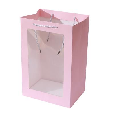 China Recycled Materials Flower Kraft Paper Bag Open Window Gift Bag Transparent Window Handbag for sale