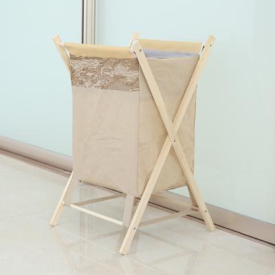 China Folding Clothes Storage Basket Floor Standing Mesh Pocket Magazine Holder Warm Wooden Storage Basket for sale