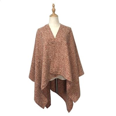 China New Winter Fashion Leopard Jacquard Acrylic Jacquard Turned Edge Women Sweater Poncho Shawl for sale