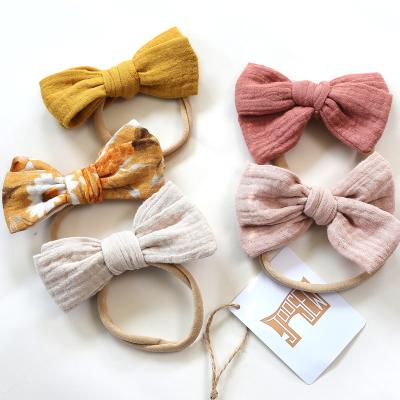 China Super Soft Muslin Cotton Gauze Babies Hair Clip Set Flower Printed Muslin Knot Bow Toddler Headband Custom Made for sale