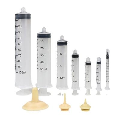 China Automatic Puppy Milk Station Feeder Medication Feeder Tool Cat Dog Animals Wildlife Silicone Puppy Nipple Feeding Feeder With Syringe for sale