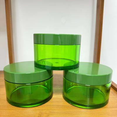 Chine Produit cosmétique pour animaux de compagnie, injectable par une paroi épaisse Bouteille de crème de 200 ml vert transparent en stock à vendre