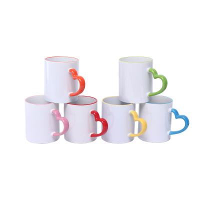 China Sublimation Disposable White 11oz 12oz Color Lip And Handle Coated Coffee Mug With Heart Handle for sale