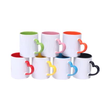 China Disposable Coated Sublimation Masks Color 11oz Inside Ceramic Coffee Mug With Heart Handle for sale