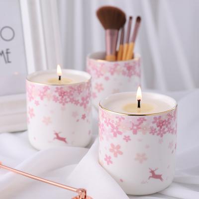 China Custom Pink Ceramic Sakura Candle Jar For Scented Candles Making Home Decoration Candle Vessels for sale