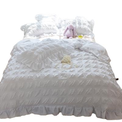 China Newest Girls Favorite White Cotton Seersucker Fabric Bedding Anti-Static Set Dreamy Home Textile For Bedroom for sale