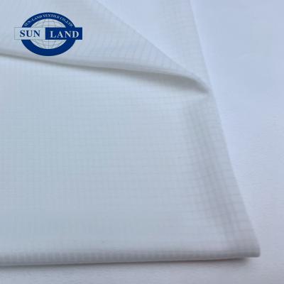 China Anti-UV Fabric For Sportswear Half-Sheen Knitted Polyester Dry Fit Mini Waffle for sale